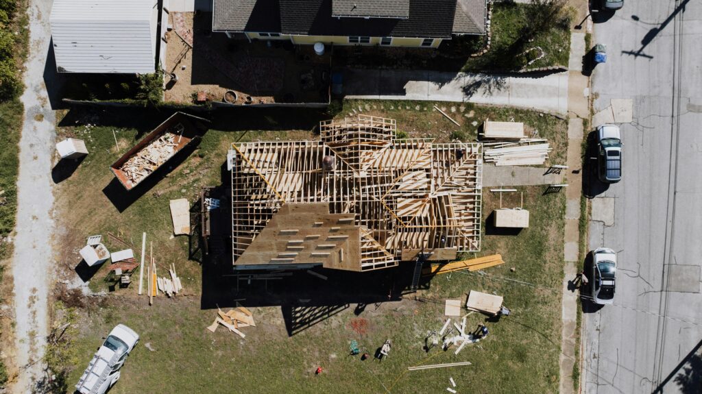 pexels-photo-28964416-28964416 Aerial view of a house under construction in Chattanooga, showcasing the building process.